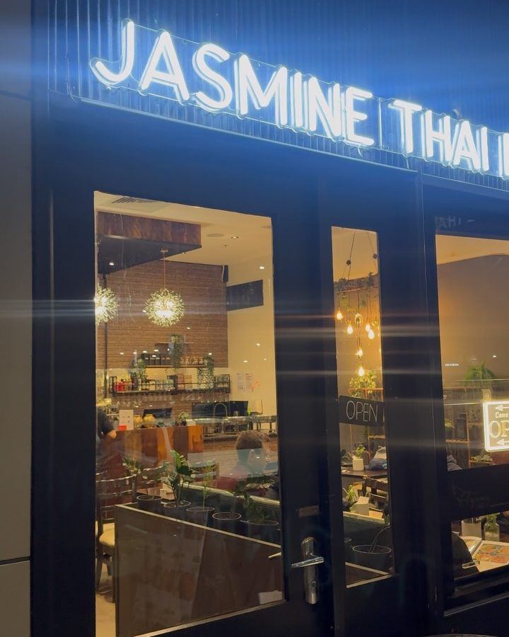 Jasmine Thai restaurant windows at night after cleaning